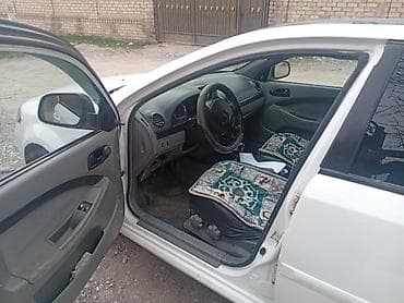 mazda 6: Chevrolet Lacetti: 2011 г., 1.4 л, Седан — 4
