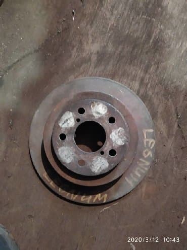 проточка тормозных дисков не снимая с машины: Задний тормозной диск Mitsubishi Б/у, Оригинал — 1