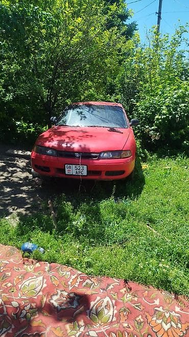 авто жпс: Mazda 323: 1998 г., Седан — 1