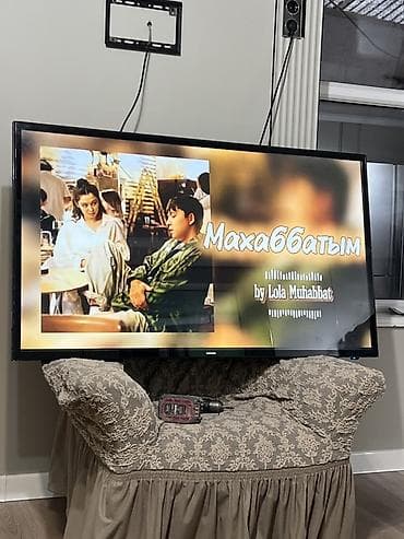Телевизор Samsung с диагональю 55" (примерно 140 см). - Тонкие рамки
