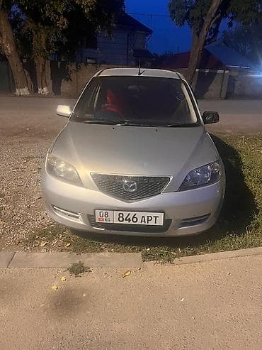 Mazda Demio: 2004 г., 1.5 л, Автомат, Газ, Хэтчбэк