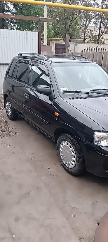 jac m3: Mazda Demio: 2000 г., Автомат, Бензин, Хэтчбэк — 4