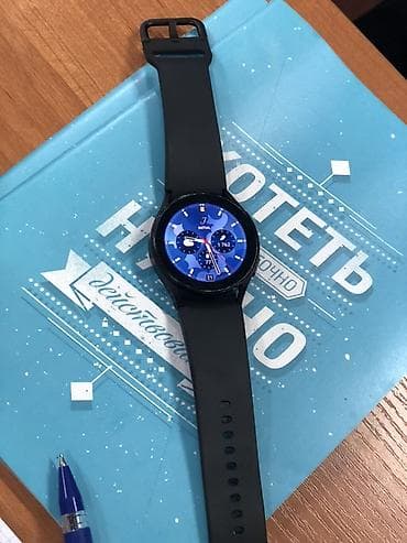 Фото и видеокамеры: Умные часы с круглым дисплеем и черным силиконовым ремешком — 1