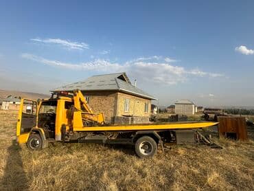 услуги эвакуатора крана: С гидроманипулятором, С ломаной платформой — 2