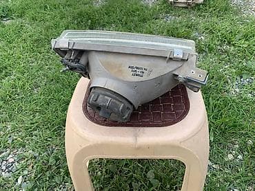 mini jack: Передняя левая фара Mazda 1998 г., Новый, Оригинал — 2