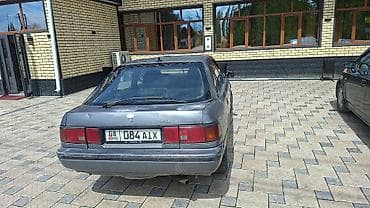 Toyota Corolla: 1990 г., Лифтбек — 2