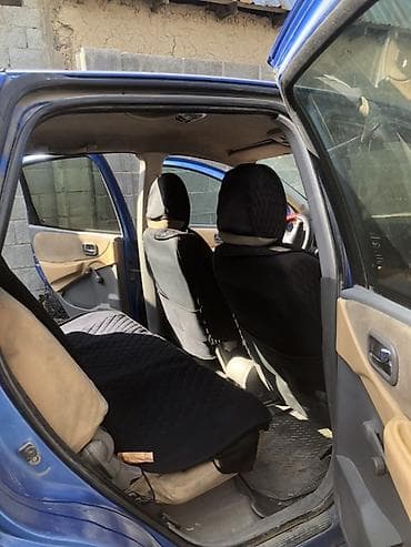 Nissan Note: 2001 г., Механика, Хэтчбэк — 4