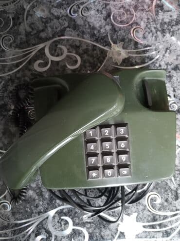 телефон городской: Стационардык телефон Зымдуу, Үндүн деңгээлин жөнгө салуу — 1