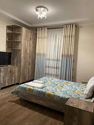 дом таатан: Уютный коттедж с террасой - Просторная крытая терраса с мягкой — 2