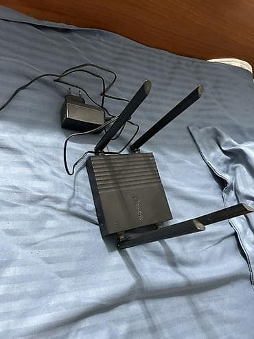 продам модем: TP-Link Archer C64 (RU) — двухдиапазонный Wi‑Fi роутер AC1200 4 LAN — 1