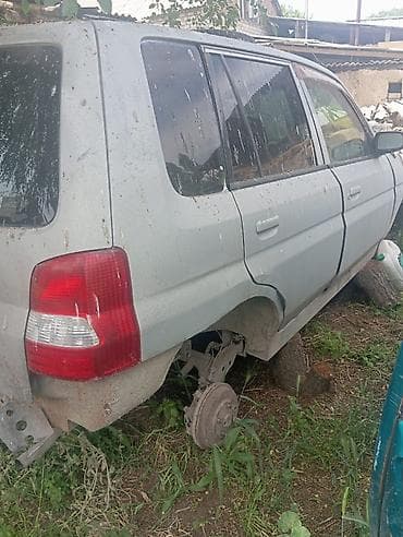 аудио касета: Mazda 2: 2003 г., 1.3 л, Автомат, Бензин, Хэтчбэк — 3