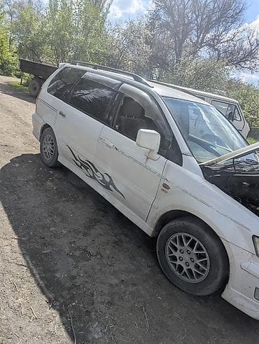 kia k2: Mitsubishi Chariot: 1998 г., Бензин, Минивэн — 3