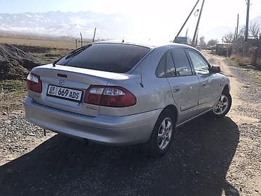 12 220: Mazda 626: 2000 г., 2 л, Механика, Бензин, Седан — 2