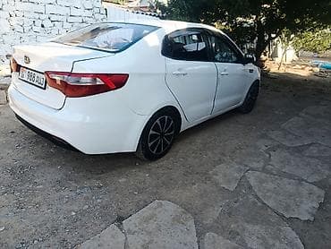 Kia Rio: 2014 г., 1.6 л, Механика, Газ, Седан