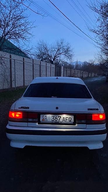 ауди 100 с: Mazda 626: 1991 г., Механика, Седан — 10