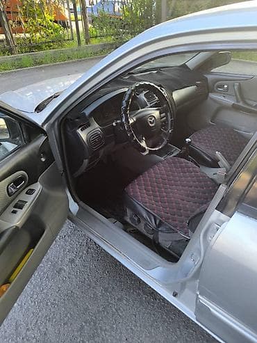 mazda 3: Mazda 323: 2001 г., 1.6 л, Механика, Бензин — 6