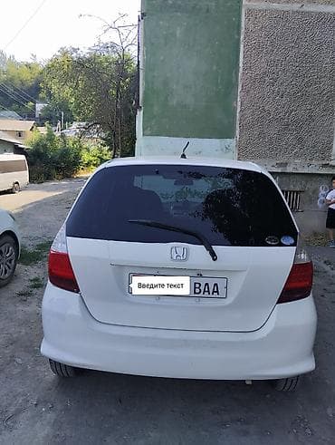 mazda 2000: Honda Fit: 2005 г., 1.3 л, Вариатор, Бензин, Хэтчбэк — 5