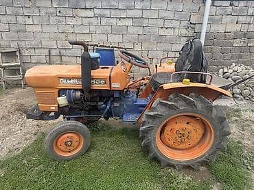 услуги минитрактора: Продаю Минитрактор Kubota L1500 с комплектом навесного оборудования — 1