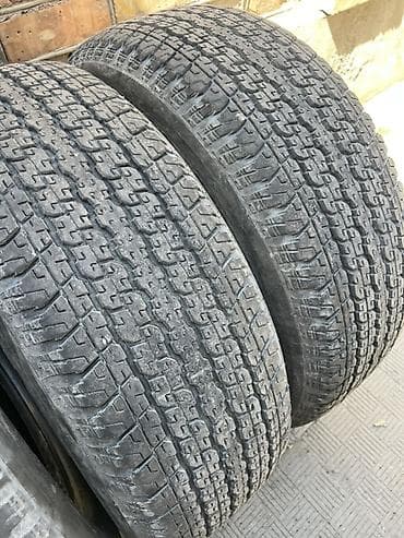 е 303 302: Шины 265 / 60 / R 18, Всесезонная, Комплект, Внедорожные (АТ/МТ), Bridgestone — 2