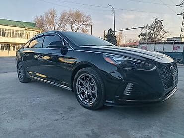 авто левый руль: Черный седан бизнес-класса с выразительным спортивным обликом — 4