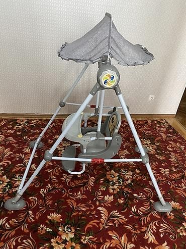 Детские качели: Детские напольные качели со столиком и козырьком.Изъяны можно увидеть — 3