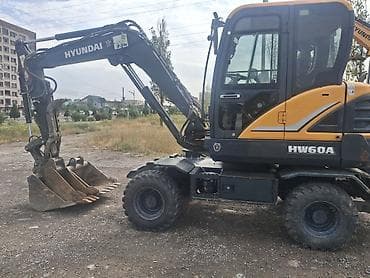 эксковатор хундай 60: Экскаватор, Hyundai, Колесный — 3