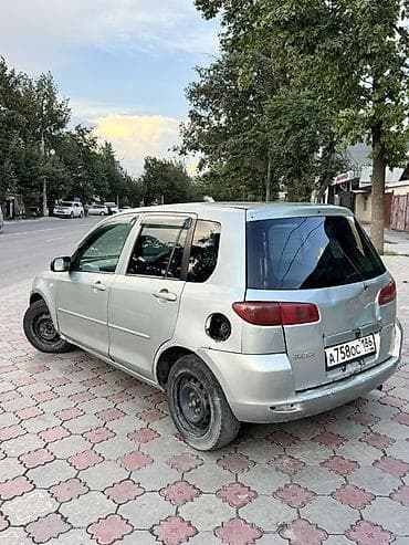 забыл: Mazda Demio: 2003 г., 1.3 л, Автомат, Газ, Хэтчбэк — 2