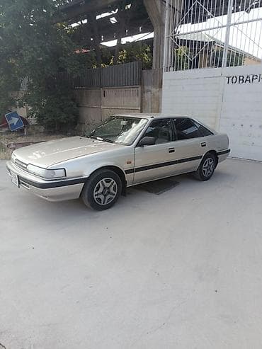 2 gz: Mazda 626: 1990 г., Седан — 2