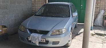 байд машина: Mazda 323: 2001 г., 1.6 л, Автомат, Бензин, Универсал — 1