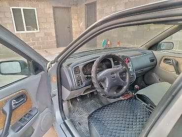 golf 5: Nissan Primera: 2001 г., 2 л, Механика, Бензин, Хэтчбэк — 4