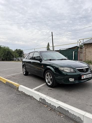 mistra: Mazda 323: 2003 г., 1.6 л, Автомат, Бензин, Универсал — 4