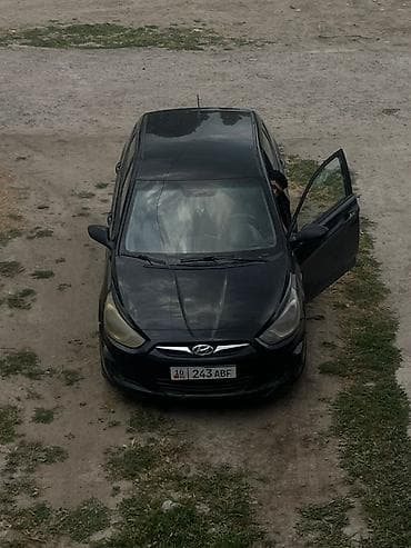 капот на соната: Hyundai Solaris: 2011 г., Механика, Хэтчбэк — 1