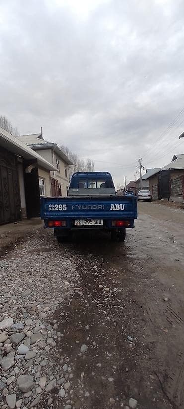 byd e3: Hyundai Porter: 2002 г., 2.4 л, Механика, Бензин, Пикап — 3