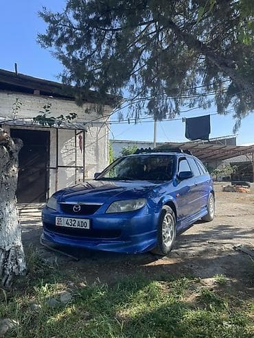 аренда mazda: Mazda 323: 2002 г., 1.6 л, Механика, Бензин, Хэтчбэк — 2