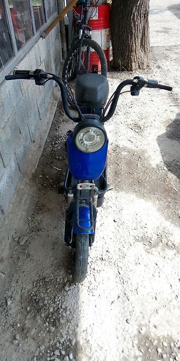 электрический мапед: Электроскутер (городской мини-скутер) - Компоновка: низкая широкая — 2