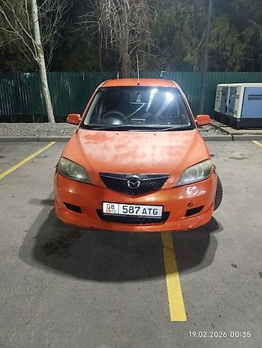 lada 06: Компактный 5‑дверный хэтчбек оранжевого цвета. Основные особенности — 5