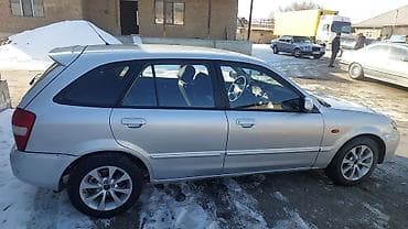 Mazda: Mazda 323: 2002 г., 1.6 л, Механика, Бензин, Универсал — 5