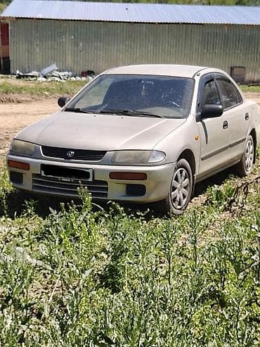 mazda 121: Mazda 323: 1996 г., 1.5 л, Механика, Бензин, Седан — 5