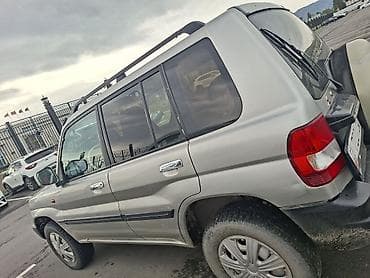 мицубиси голд: Mitsubishi Pajero iO: 2001 г., 2 л, Автомат, Бензин, Внедорожник — 3