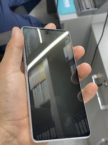 бюджетный: Google Pixel 7, Б/у, 128 ГБ, цвет - Белый, 1 SIM, eSIM — 4
