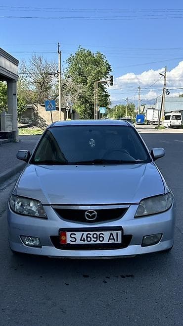 mini kooper: Mazda 323: 2001 г., 1.6 л, Ручные, Бензин, Хэтчбэк — 2