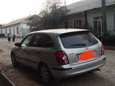 мазда 626 движок: Mazda 323: 1999 г., Хэтчбэк — 5