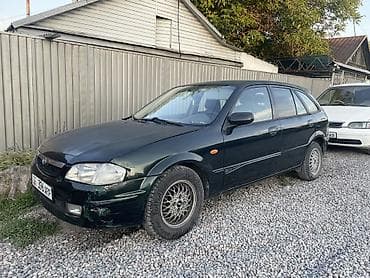 Mazda: Mazda 323: 1998 г., 1.5 л, Механика, Бензин, Хэтчбэк — 2