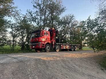 Услуги манипулятора (кран-манипулятор на длинном бортовом полуприцепе)