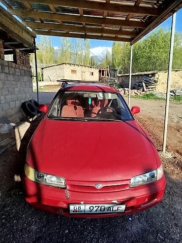 кирг шёлк: Mazda 323: 1995 г., Седан — 1