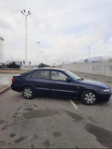 3 ряд gx: Mazda 626: 2000 г., 1.8 л, Механика, Бензин, Седан — 5