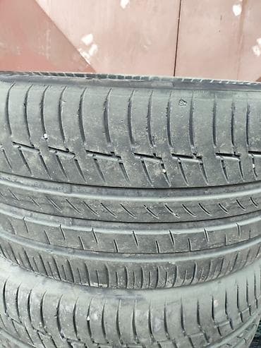 Колпаки: Комплект летних шин R22" Continental - Размер: 275/35 R22, 315/30 — 2