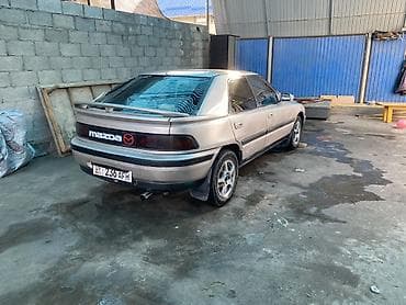 Mazda 323: 1991 г., 1.8 л, Механика, Бензин, Лифтбек — 8