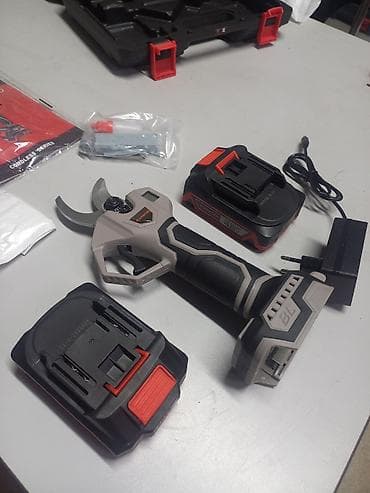 куста рез: Аккумуляторный электрический секатор Ураган YP5302 Назначение: - — 2