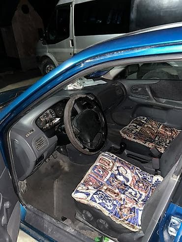 shevrolet matiz: Mazda 323: 1998 г., 1.5 л, Механика, Бензин, Хэтчбэк — 2